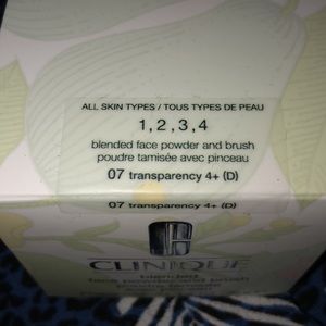 Brand new Clinique powder with brush